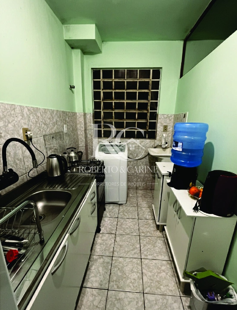área de serviço acoplada com cozinha.jpg